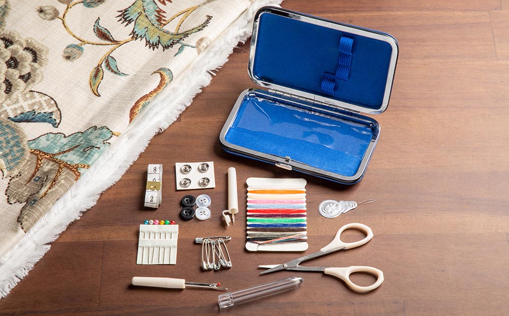 A sewing kit has essential notions in a compact, grab-and-go case.